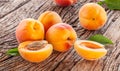 Ripe apricots on old wooden table Royalty Free Stock Photo