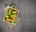 Ripe autumn pears on a wooden background. Fall. Harvest. Healthy food. Top view