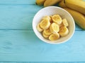 Ripe banana plate piece seasonal appetizing yummy lifestyle blue wooden background Royalty Free Stock Photo