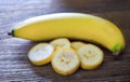 Ripe Banana sliced on wood