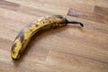 Speckled ripe banana on table