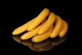 Ripe bananas on black background
