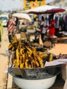 grilled bananas are being sold at a roadside farmers market in africa Royalty Free Stock Photo