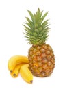 Ripe bananas and pineapple on a white background Royalty Free Stock Photo