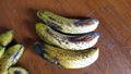 Ripe bananas on a wooden tabl