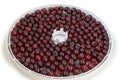 Berries of cherries on plate for dryer of food
