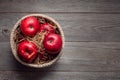 Ripe big red apples in a basket on a wooden table, free space, apple harvest Royalty Free Stock Photo