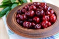 Ripe black cherries in a clay bowl Royalty Free Stock Photo