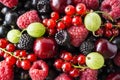 Ripe blackberries, blackcurrants, cherries, red currants, raspberries and gooseberries. Mix berries and fruits. Top view. Backgrou Royalty Free Stock Photo