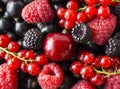 Ripe blackberries, blackcurrants, cherries, red currants and raspberries. Mix berries and fruits. Top view. Background berries and Royalty Free Stock Photo