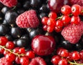 Ripe blackcurrants, cherries, red currants, raspberries. Mix berries and fruits. Top view. Background berries and fruits Royalty Free Stock Photo