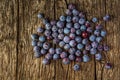Ripe blue plums cherry plum on a dark wooden ruskic background. Top view or flat lay. Royalty Free Stock Photo