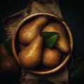 Ripe brown pears in a wooden bowl, dark background, rustic style Royalty Free Stock Photo