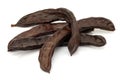 Ripe carob pod on white background Royalty Free Stock Photo