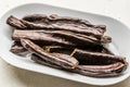 Ripe Carob Pods in Plate Ready to Eat Royalty Free Stock Photo