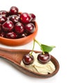 Ripe cherries and creamy mousse isolated on white . Free space for text Royalty Free Stock Photo