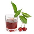 Ripe cherries and juice in glass Royalty Free Stock Photo