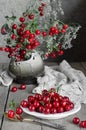 Ripe cherries in a plate and bouquet. Selective focus Royalty Free Stock Photo