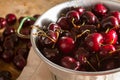 Ripe cherries on rustic wooden background