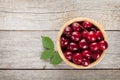 Ripe cherries on wooden table Royalty Free Stock Photo