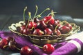 Ripe cherry in an old vase Royalty Free Stock Photo