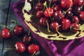 Ripe cherry in an old vase Royalty Free Stock Photo