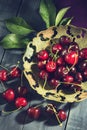 Ripe cherry in an old vase Royalty Free Stock Photo