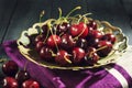 Ripe cherry in an old vase Royalty Free Stock Photo