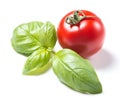 Ripe cherry tomato and fresh basil leafs isolated on white background Royalty Free Stock Photo