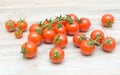 Ripe cherry tomatoes closeup on wooden board Royalty Free Stock Photo