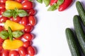 Ripe cherry tomatoes, cucumbers, red and yellow paprika Royalty Free Stock Photo