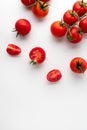 Ripe cherry tomatoes on white background. Flat lay. Summer food concept Royalty Free Stock Photo