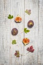 Ripe chopped figs on a white wooden surface