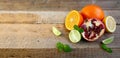 Ripe Citrus Fruit on the Old Wooden Table. Orange, Lime, Lemon Mint. Healthy Food. Summer Background. Royalty Free Stock Photo