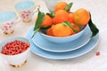 Ripe clementines and red skin pinuts Royalty Free Stock Photo