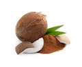 Ripe coconuts and pile of brown sugar on white Royalty Free Stock Photo