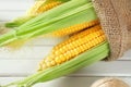 Ripe corn cobs on wooden background, closeup Royalty Free Stock Photo