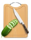 Ripe cucumber cut segment on board Royalty Free Stock Photo