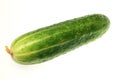 Ripe cucumber on a white background