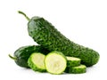 Ripe cucumbers and slices close-up on a white background. Isolated.