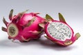 Ripe dragon fruit, pitaya or pitahaya on white background, fruit healthy concept. Tropical fruits, whole and sliced dragon fruit. Royalty Free Stock Photo