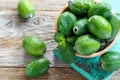Ripe feijoa in a wooden bowl. Royalty Free Stock Photo