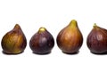 Ripe figs on a white background. Several figs. Southern fruit isolate. Purple fruit. Healthy diet