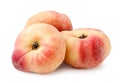 Ripe flat peaches close-up on a white. Isolated Royalty Free Stock Photo