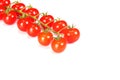 Ripe fresh Juicy organic cherry tomatoes closeup on branch isolated on a white background Royalty Free Stock Photo