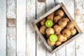 Ripe fresh kiwi fruits in wooden box Royalty Free Stock Photo