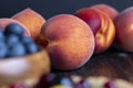 Ripe fresh peaches on a wooden table Royalty Free Stock Photo