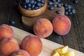 Ripe fresh peaches on a wooden table Royalty Free Stock Photo