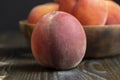 Ripe fresh peaches on a wooden table Royalty Free Stock Photo