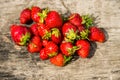 Ripe fresh strawberries on rustic wooden background. Top view Royalty Free Stock Photo